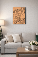 Abstract  MDF DIY wall art above a gray sofa in a living room setting.