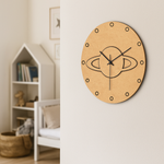 MDF DIY  wall clock with decorative design on a light-colored wall.