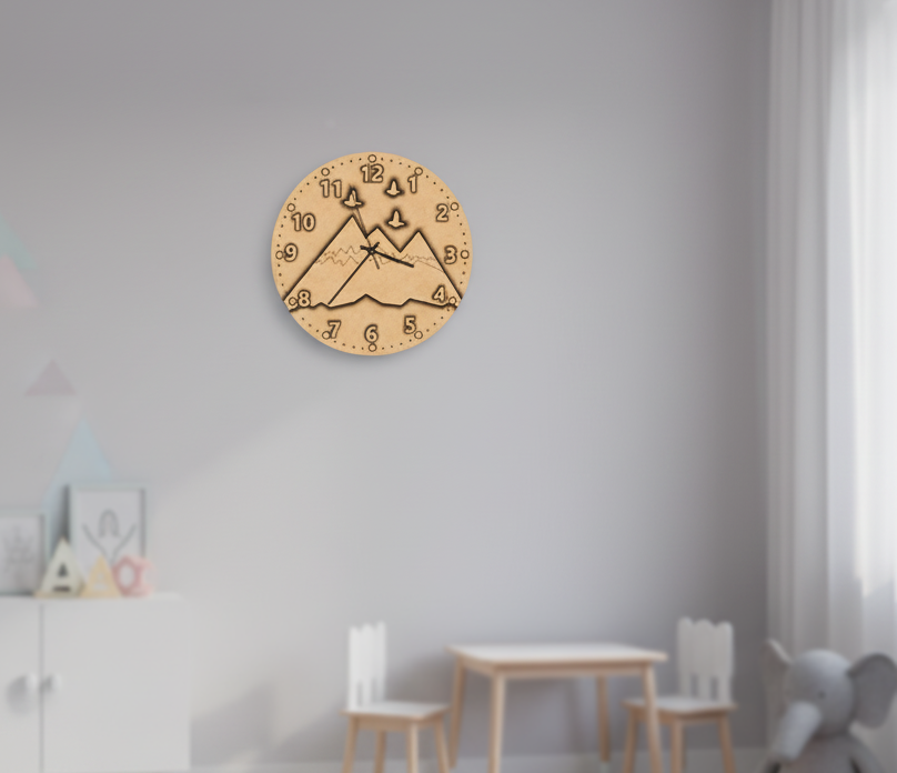 MDF DIY  wall clock with mountain design on a gray wall in a room with children's furniture.
