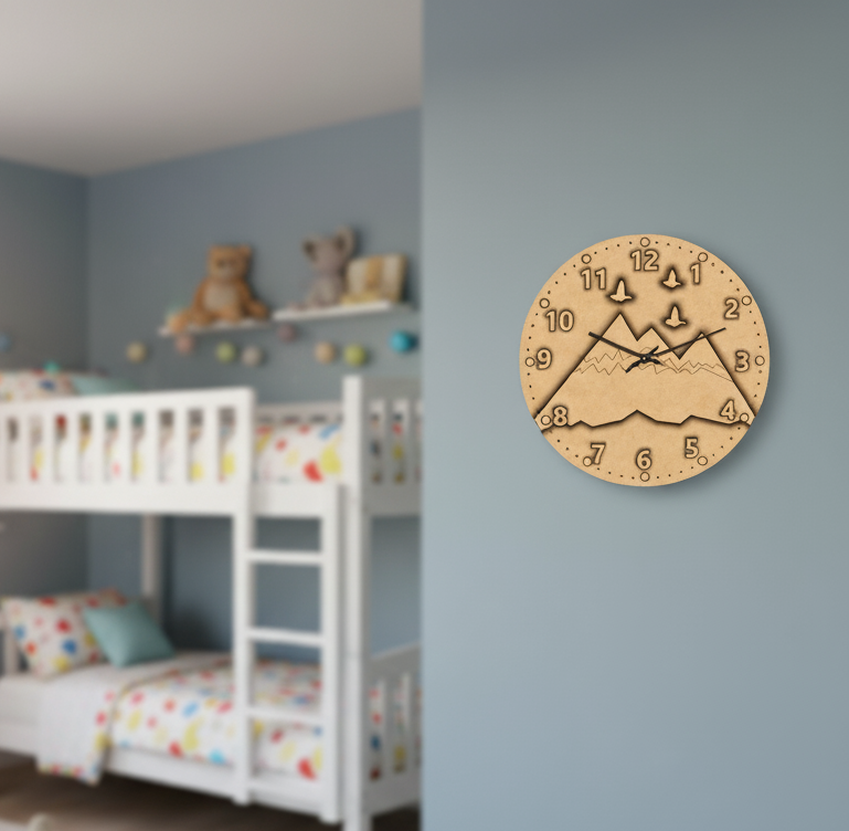 MDF DIY  wall clock with mountain design on a gray wall in a child's bedroom.