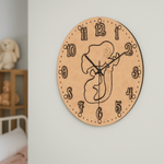 DIY MDF wall clock with a decorative design on a light background