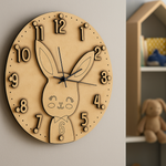 MDF DIY  wall clock with rabbit design on a beige wall.
