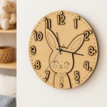 MDF DIY wall clock with rabbit design on a white wall