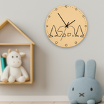 MDF DIY wall clock with bear and tree design in a room with toys