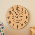 MDF DIY wall clock with butterfly and flower designs on a beige wall.