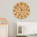 MDF DIY wall clock with a truck design on a light gray wall above a bed.