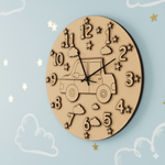 MDF DIY clock with car design and numbers on a light blue background