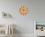 MDF DIY wall clock with decorative numbers in a nursery setting