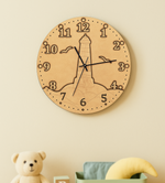 MDF DIY  wall clock with Eiffel Tower design on a beige wall, featuring a teddy bear and decorative items.