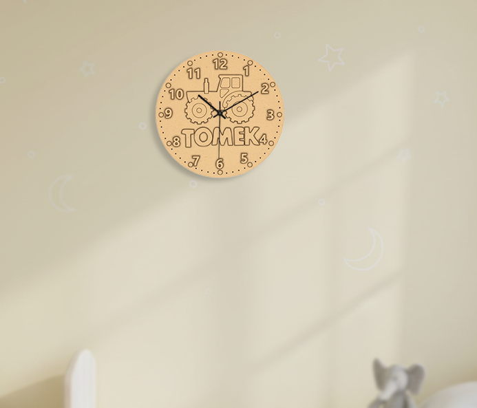 MDF DIY wall clock with 'Tomek' branding on a beige wall.