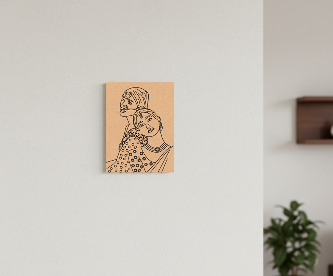 MDF DIY wall art with a stylized illustration of two women on a white wall.