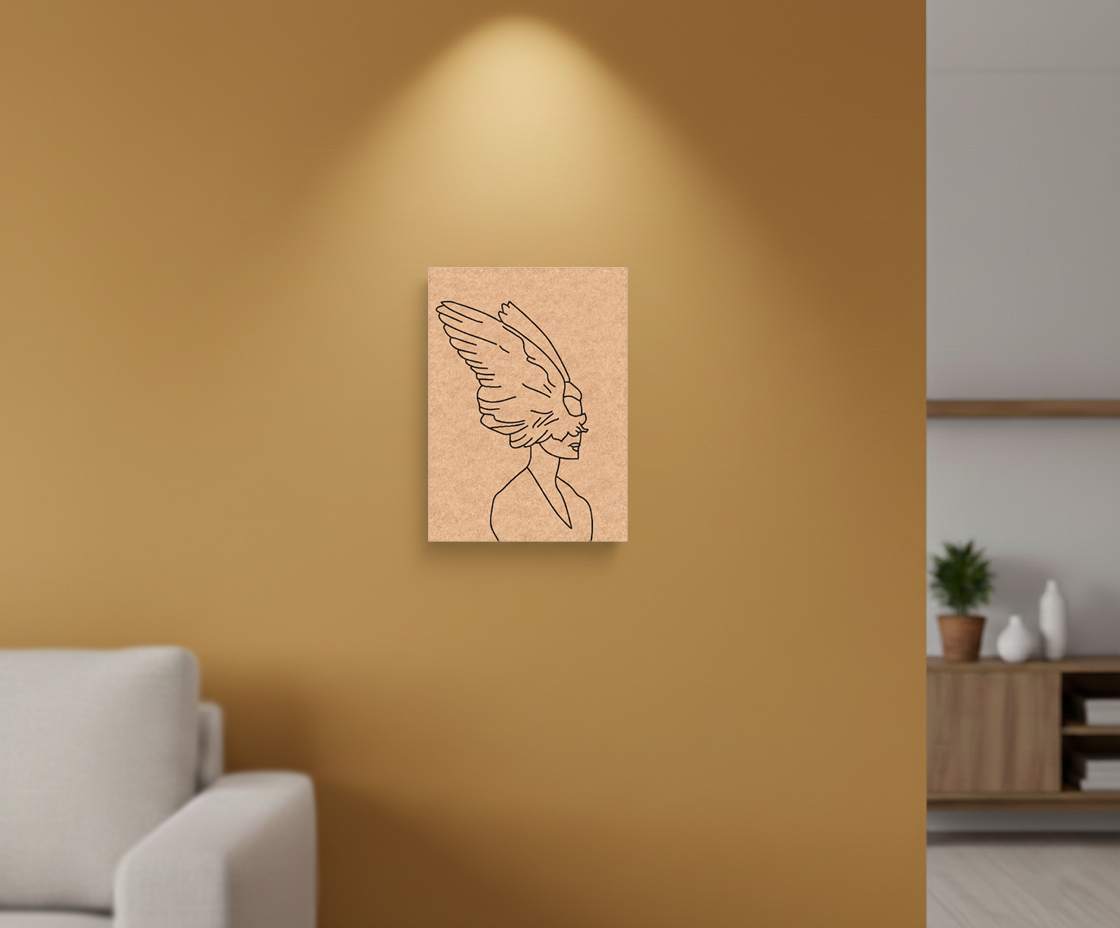 MDF DIY wall art of a woman's profile with wings on a mustard yellow wall.