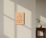 Minimalist line art of a face on a wooden panel against a light wall with soft shadows.