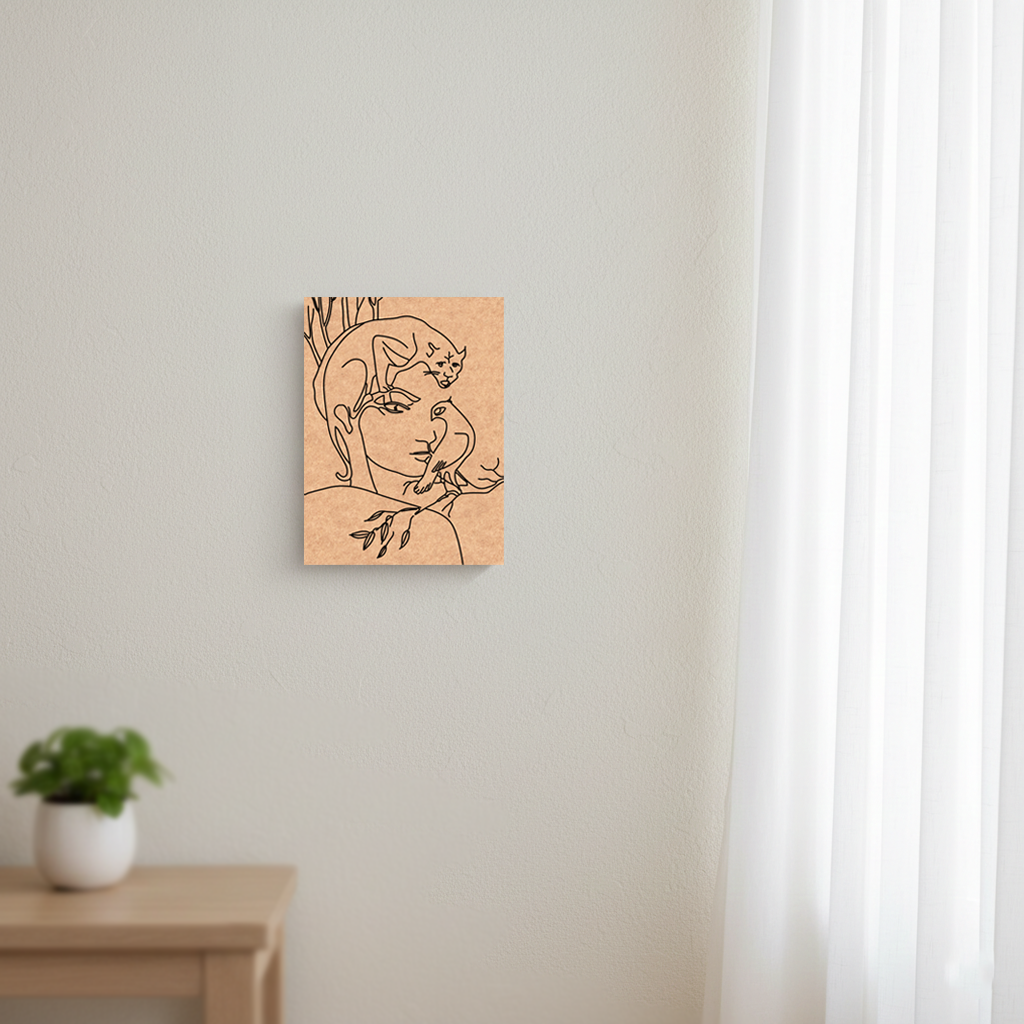 MDF DIY wall art with a minimalist design of a face and leaves on a light gray wall.