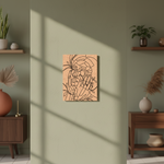 Decorative MDF DIY wall art on a green wall with wooden furniture and plants.