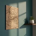 MDF DIY wall art with abstract design on a teal wall with a plant in the background