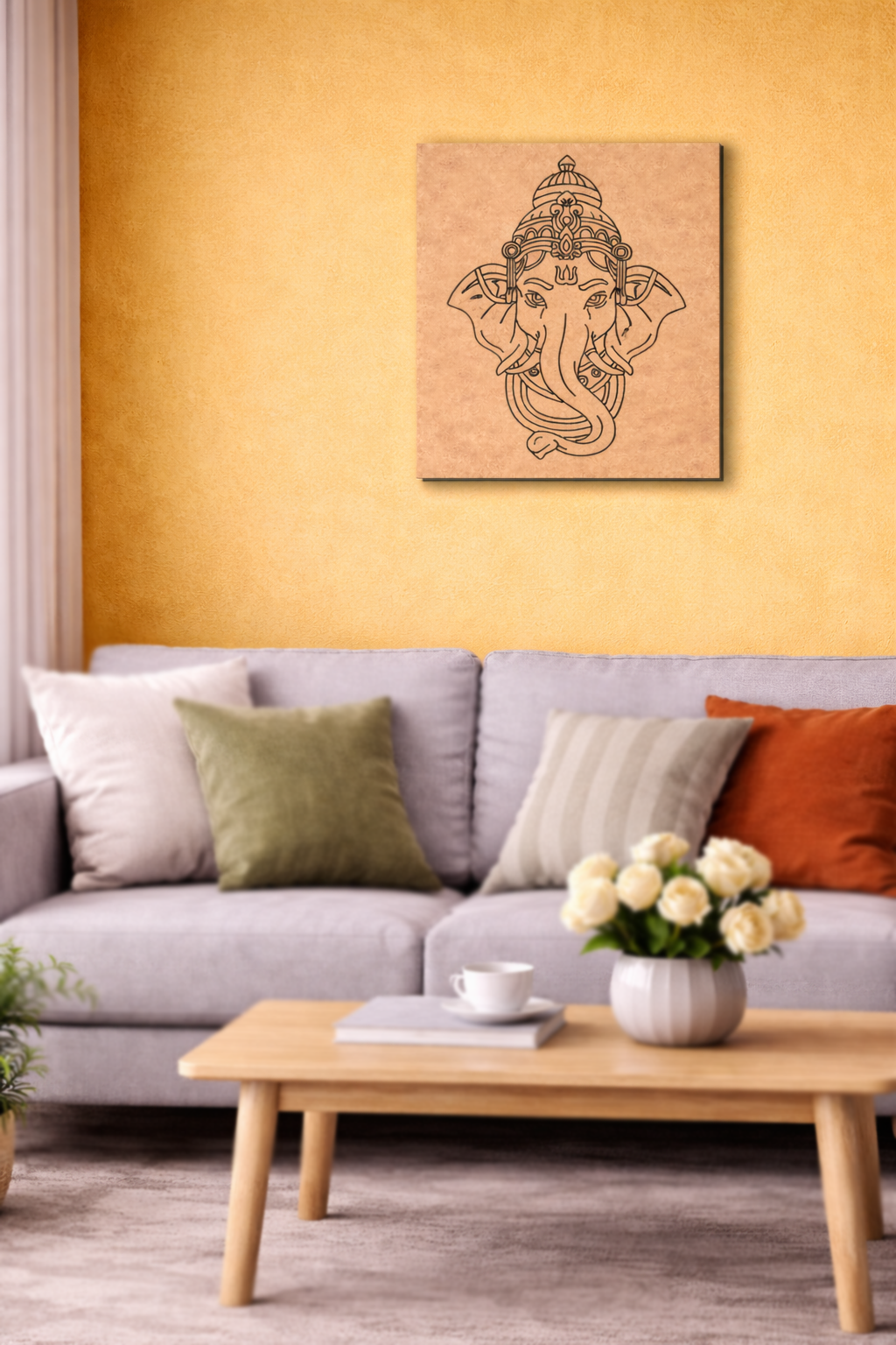 Living room with a MDF DIY wall art piece of a deity on a yellow wall above a gray sofa.