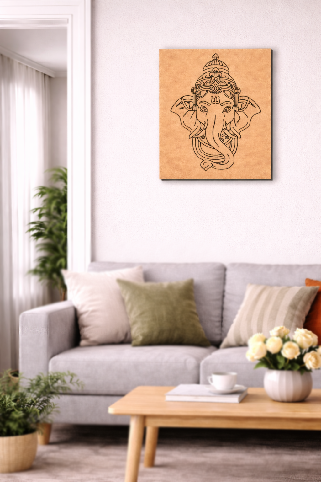 Living room with a gray sofa, coffee table, and MDF DIY wall art of a deity figure.