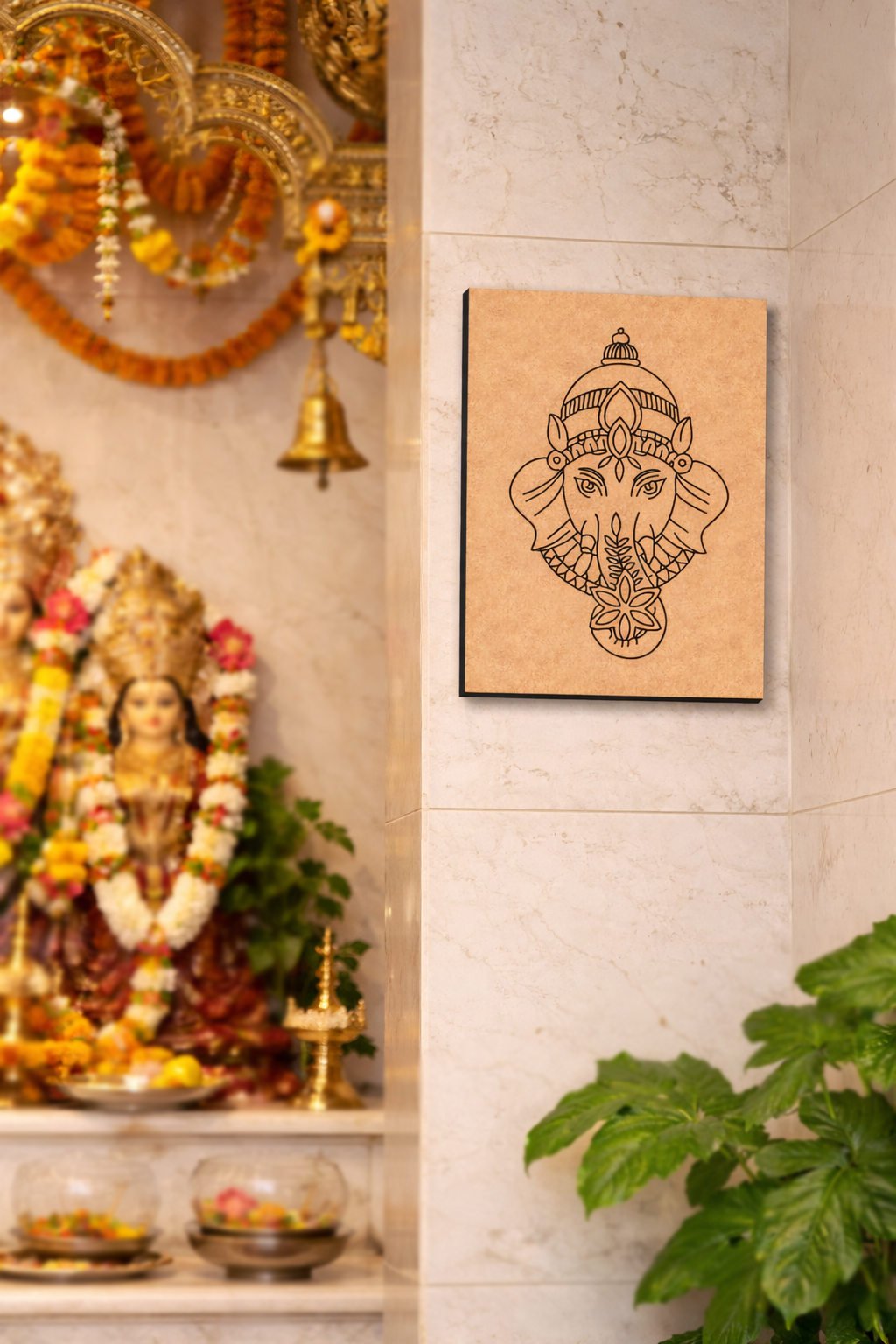 Decorative  MDF DIY wall art of a deity's face on a light-colored wall with religious statues and decorations.