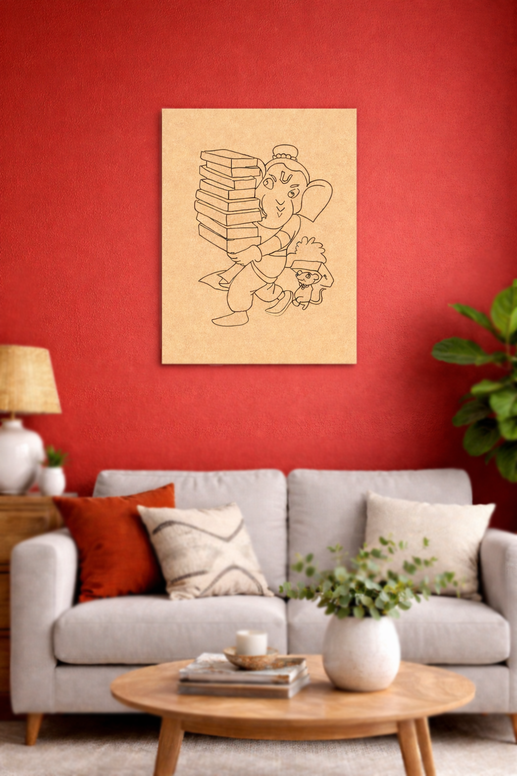 MDF DIY ganesh wall art on red wall.