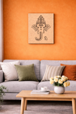 Living room with orange wall, gray sofa, wooden coffee table, and decorative items.