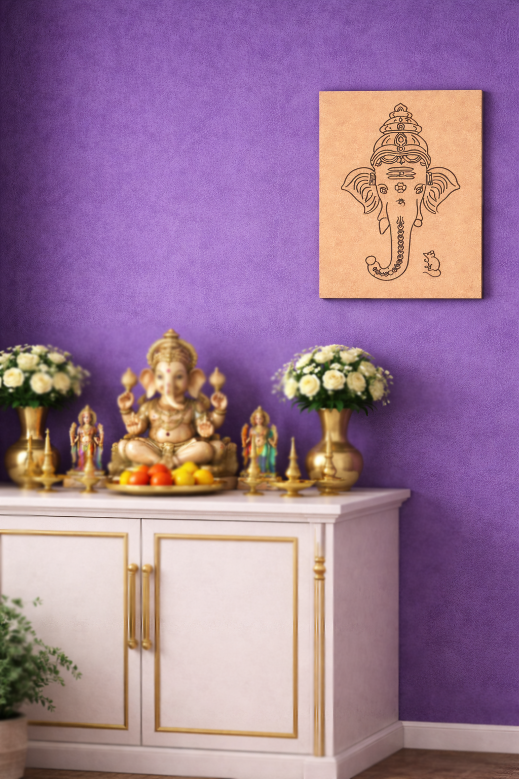 Decorative setup with a statue of Ganesha on a white cabinet against a purple wall with a MDF DIY framed artwork.