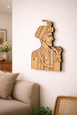 DIY MDF  wall art of a man with a turban in a living room setting.