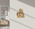 MDF DIY wall art of a woman holding a flower on a light gray wall.
