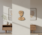 MDF DIY  wall art of a face with a turban in a room with furniture and decor.