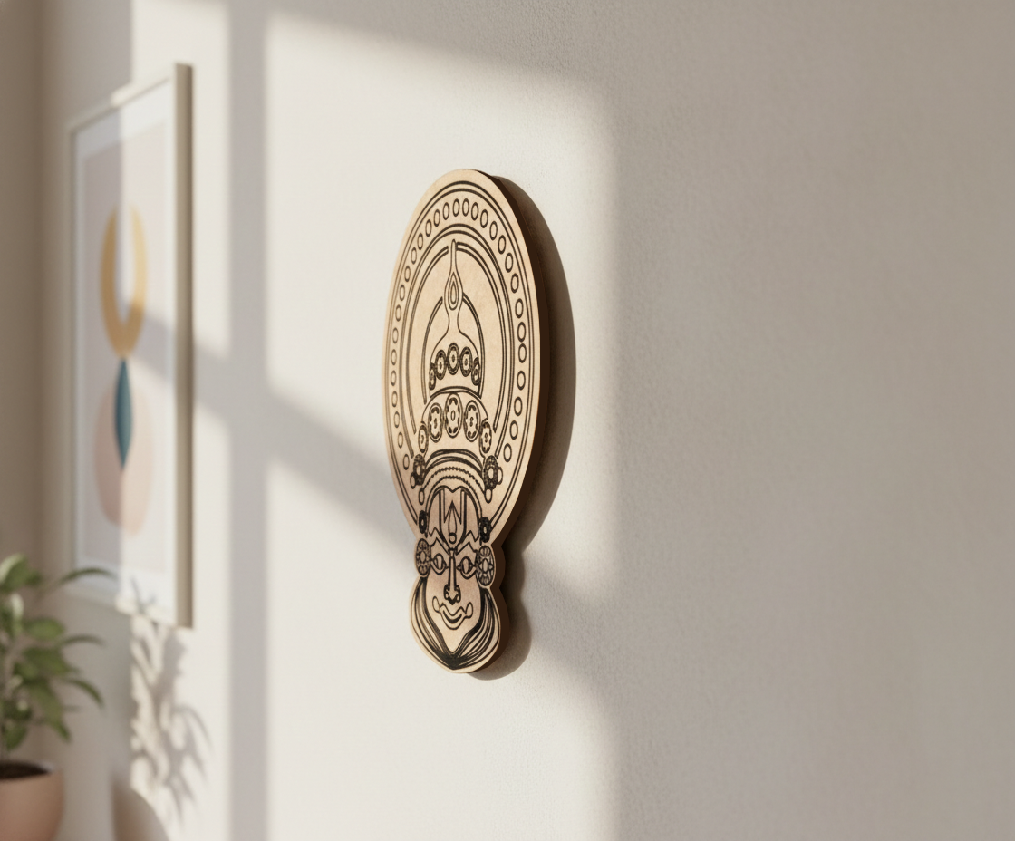 Decorative MDF DIY wall art piece on a light gray wall with a plant to the left.