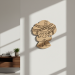 MDF DIY wall art of a face with intricate patterns on a white wall.