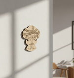 MDF DIY wall decoration of a face with intricate patterns on a light background