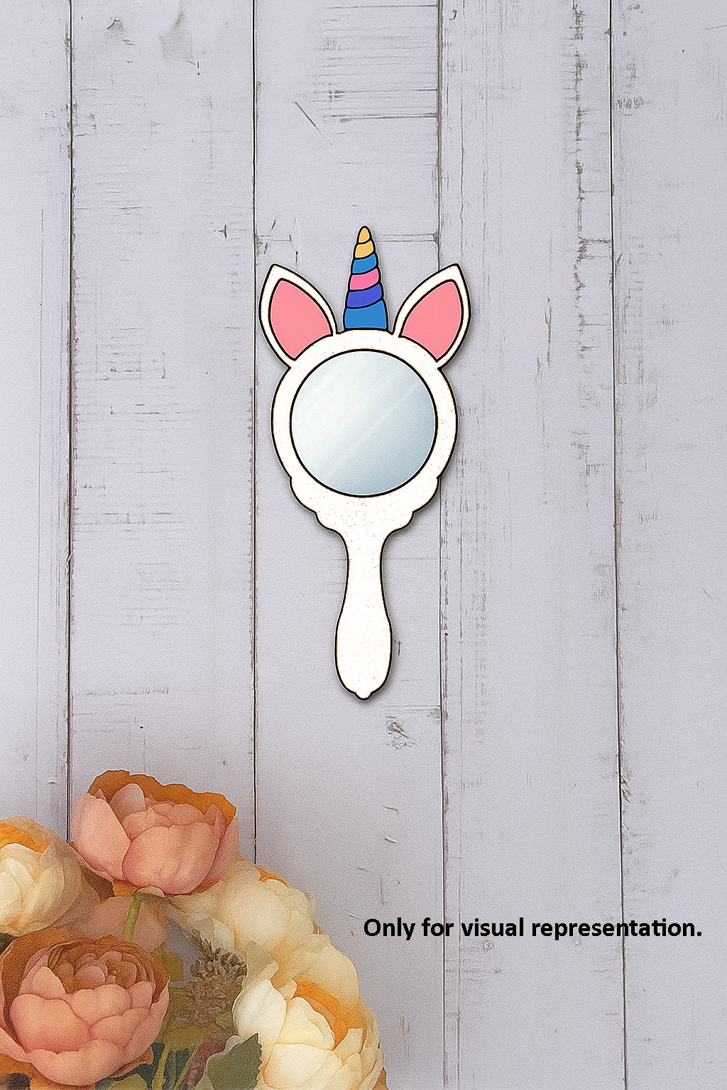 Unicorn hand mirror decorated with rainbow horn, pink ears, and fitted mirror