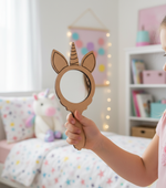 Child holding a unicorn-shaped MDF mirror in a colorful kids’ bedroom