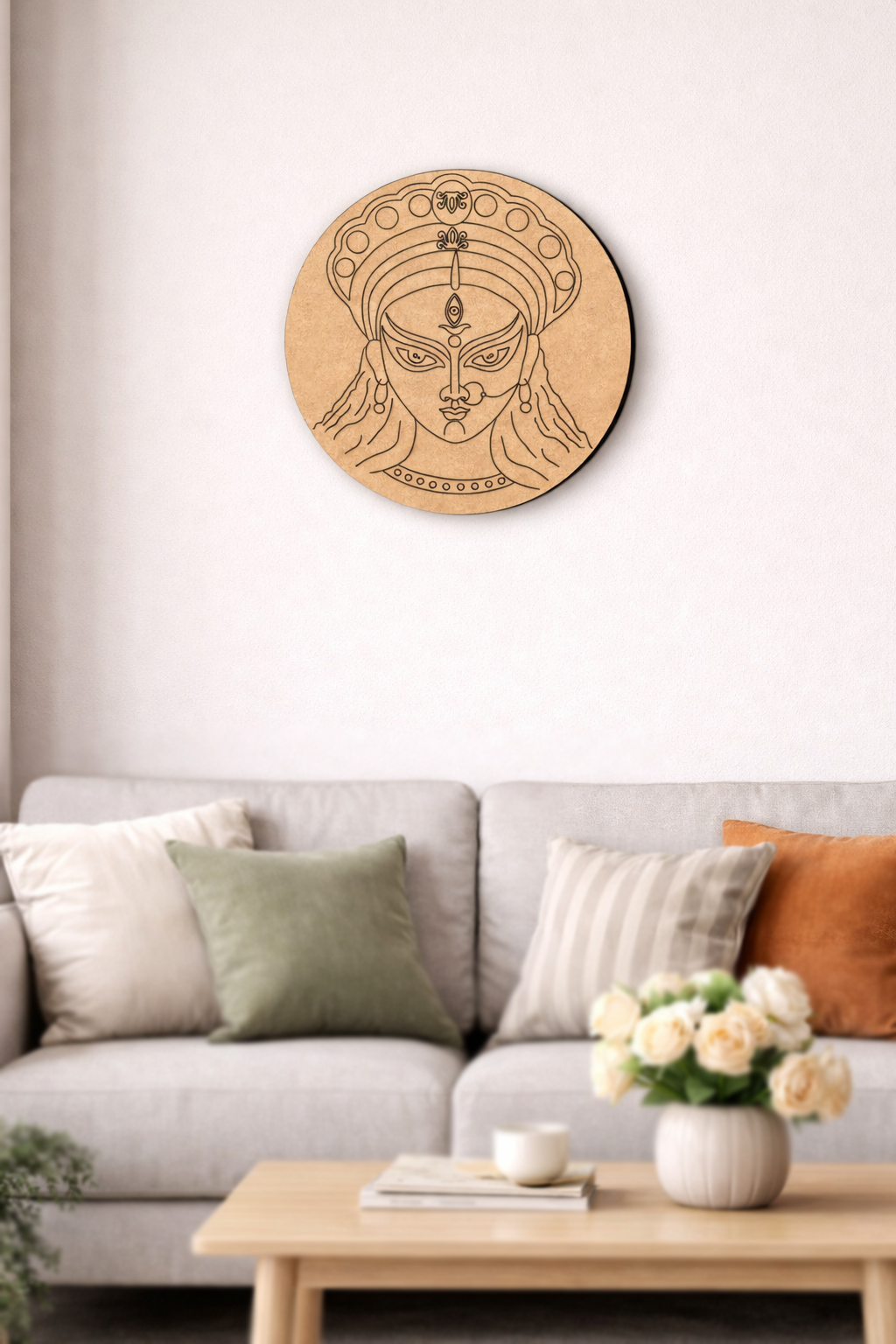 Decorative  DIY MDF Durga wall art above a sofa in a living room