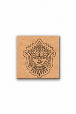 MDF DIY wall art  with engraved face design on a white background