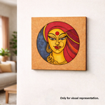 MDF DIY Framed artwork of a stylized face with red, yellow, and blue colors on a white wall.