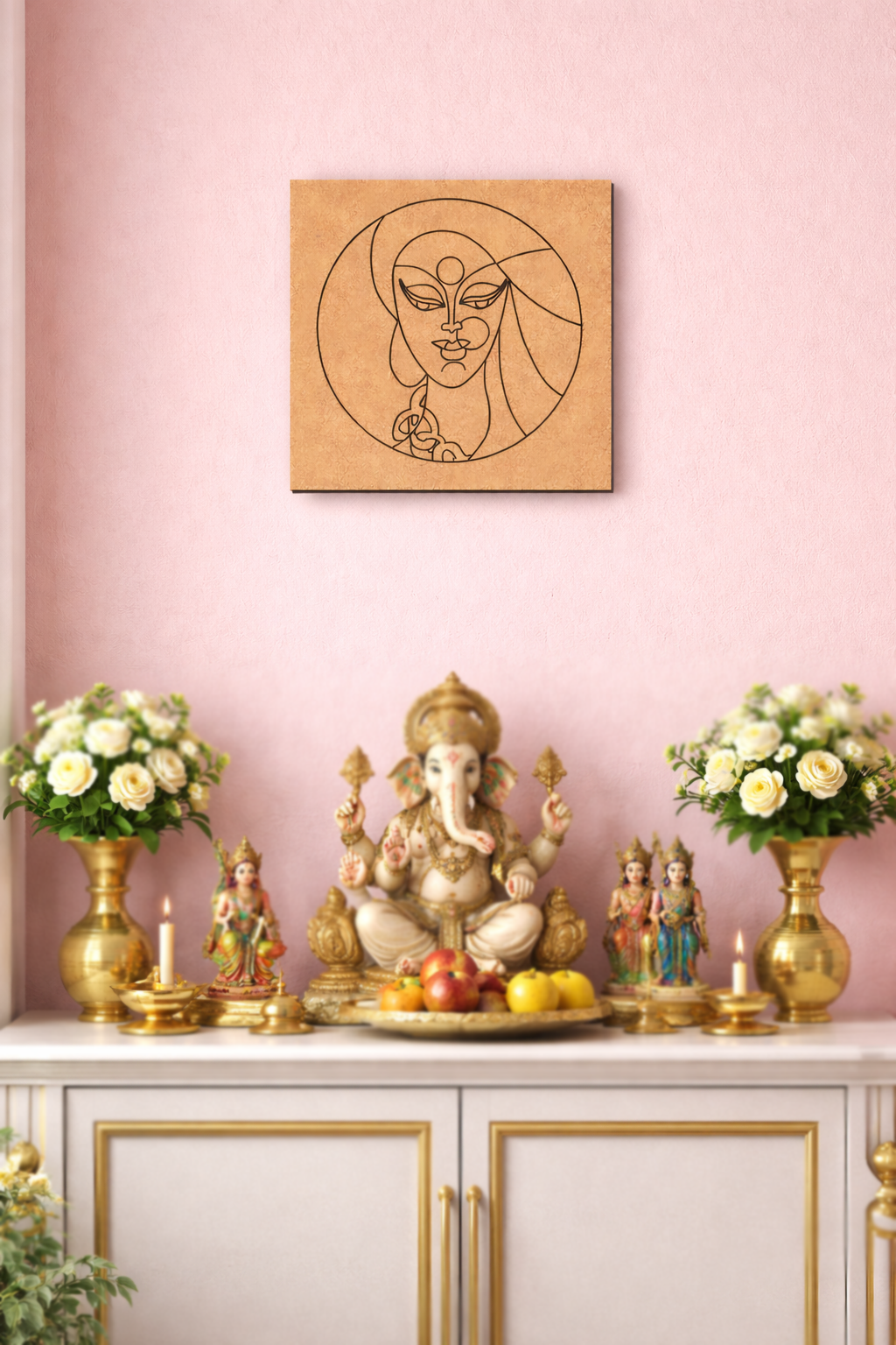 Decorative MDF DIY wall art, flowers, and candles against a pink wall with framed artwork.