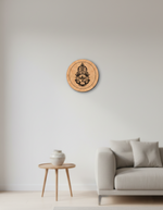 Wooden MDF DIY wall art with a face design on a white wall above a sofa and side table.