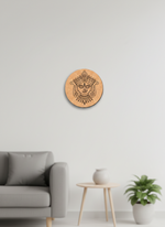 Decorative MDF DIY wall art with a face design on a wooden circle in a living room setting.