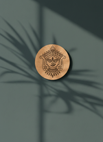 Wooden MDF DIY wall art with intricate design on a green background