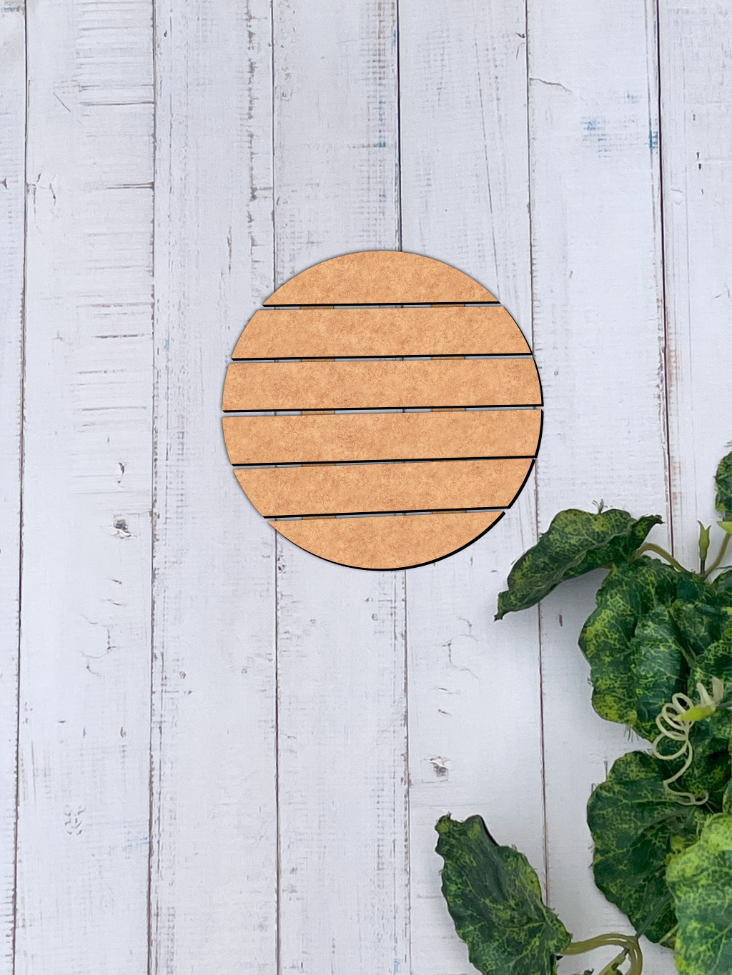 Unpainted MDF round slat-style house nameplate base cutout on wooden background for DIY painting and name lettering with size