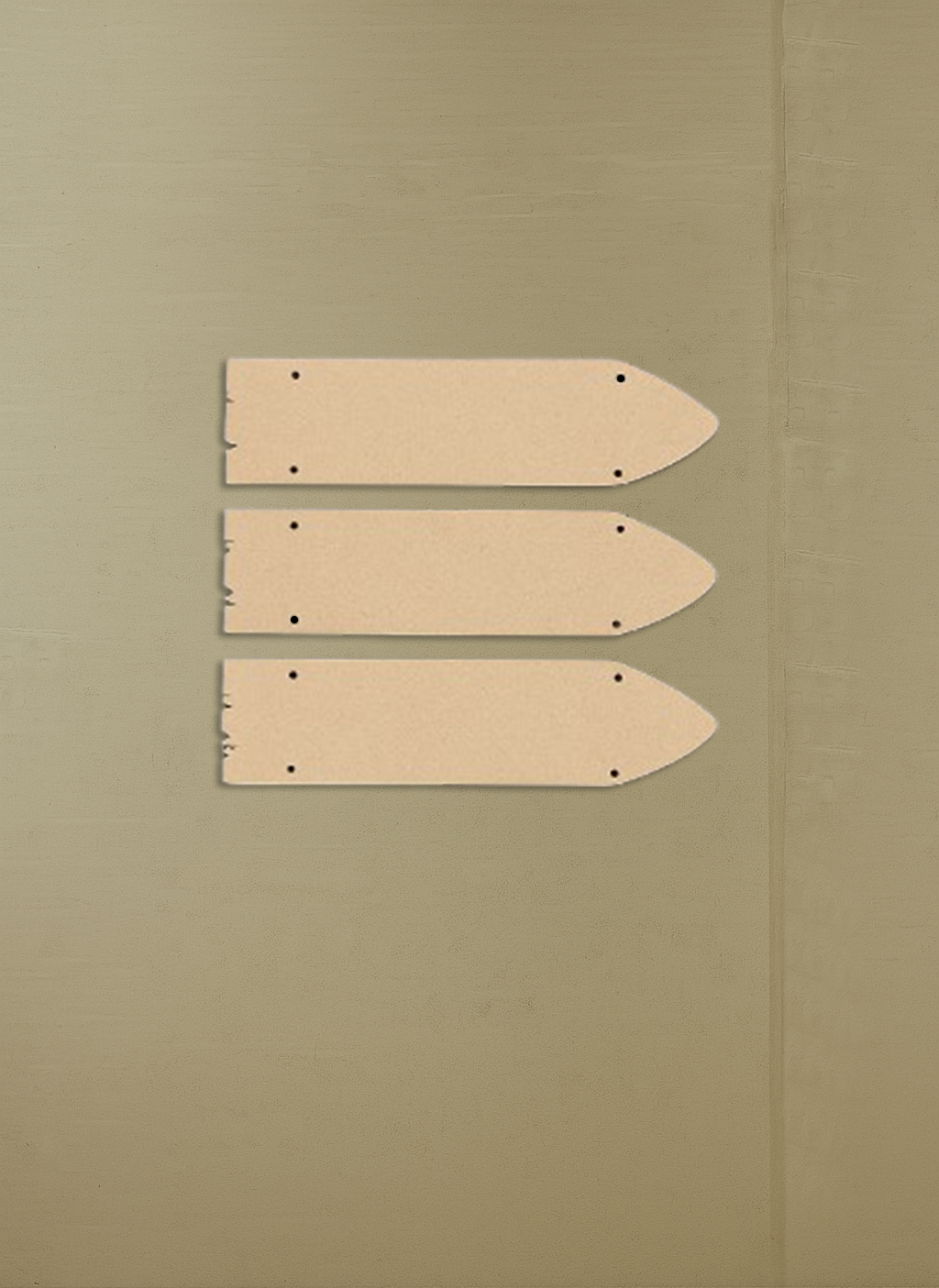 Three beige MDF board signs with nail holes on a beige background