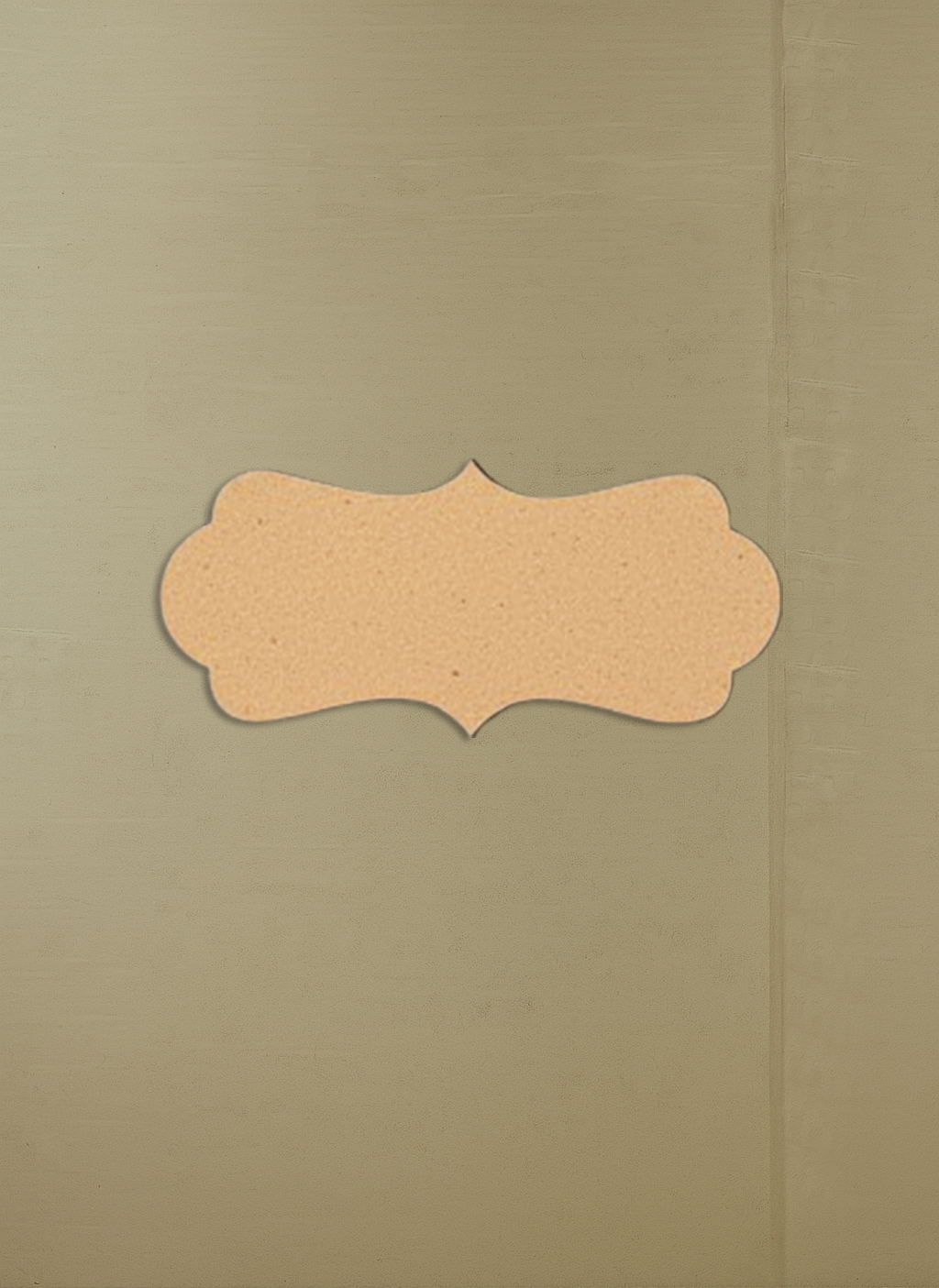 Brown book with a decorative label on a beige background