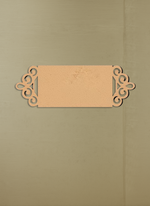 Decorative MDF board  nameplate with intricate cut-out design on a beige background