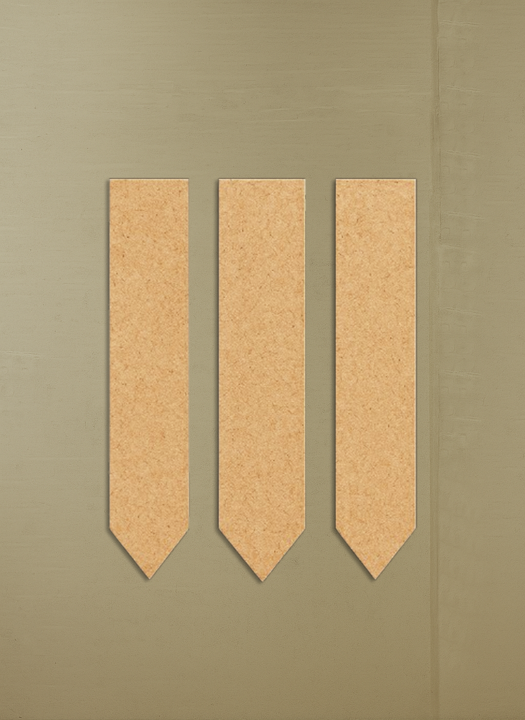 Three MDF board neckties on a matching beige background
