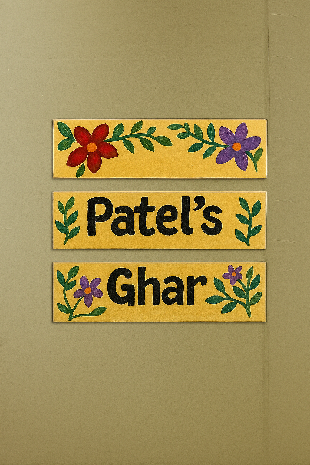 Decorative nameplate with floral designs on a yellow background, featuring 'Patel's Ghar' text.