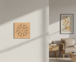 MDF DIY wall art with a sun design and 'OM' symbol on a light gray wall.