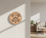 Decorative MDF DIY wall art  with symbols on a light wall, with a living room in the background.