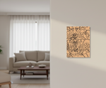 Decorative MDF DIY wall art with floral patterns on a peach background in a living room setting.